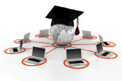 Image: Globe with cap and tassel with laptops surrounding it - DigitalGenetics - Fotolia